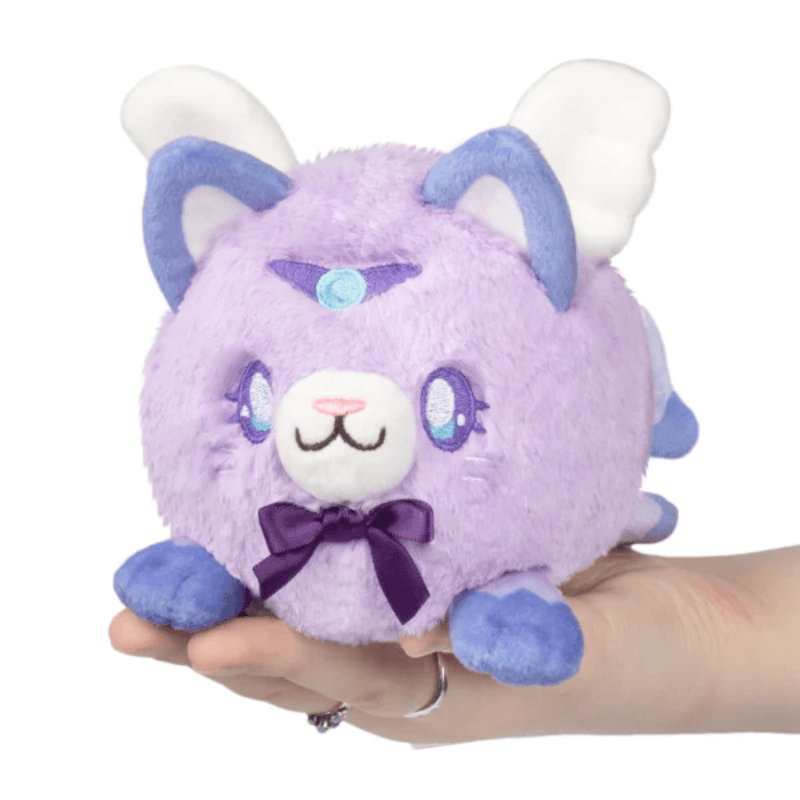 Front view of Squishable Alter Egos Magical Kitty Plush with lavender fur, wings, bow and magical forehead detail