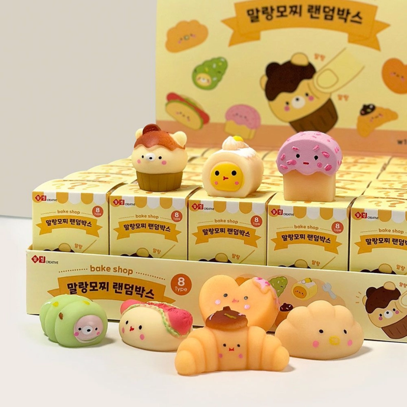 Malang Mozzi Bake Shop display tray of blind boxes with dessert mochi squishies in front