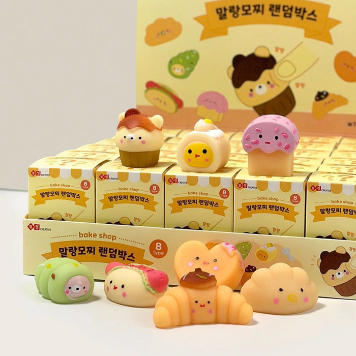 Malang Mozzi Bake Shop display tray of blind boxes with dessert mochi squishies in front