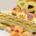 Close-up of Malang Mozzi Bake Shop blind boxes with three dessert mochi squishies on top