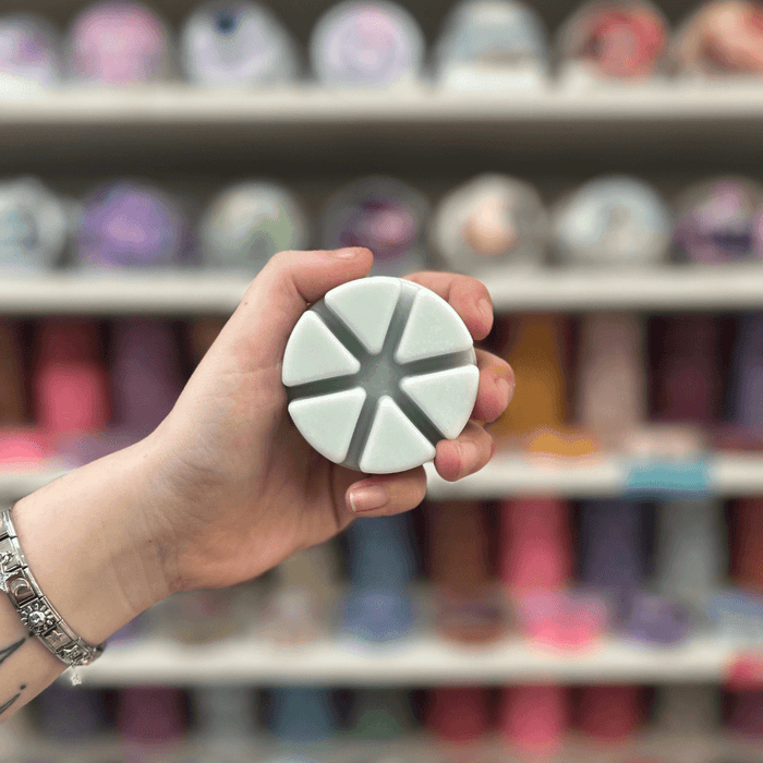 Marshmallow Clouds white segmented wax melt held in hand