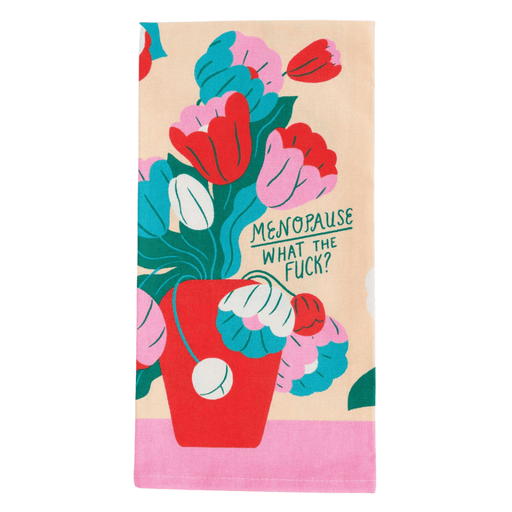 Folded Menopause What The Fuck tea towel, colourful flowers and slogan on cotton.