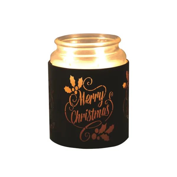 Black Merry Christmas sleeve used as a candle jar holder with lit jar inside