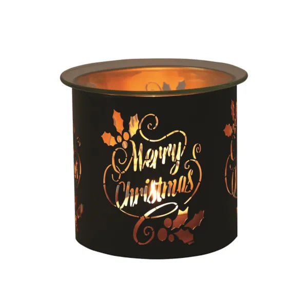 Black and gold Merry Christmas tealight wax melter glowing with warm light