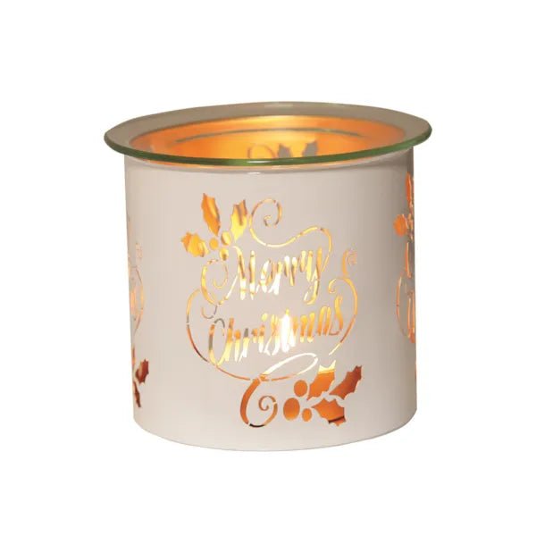 White and gold Merry Christmas tealight wax melter glowing with warm light