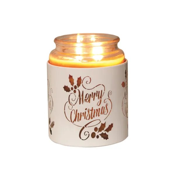 White Merry Christmas sleeve used as a candle jar holder with lit jar inside