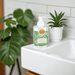 Michel Design Works Greenhouse foaming hand soap 530ml on a sink with indoor plants in the background