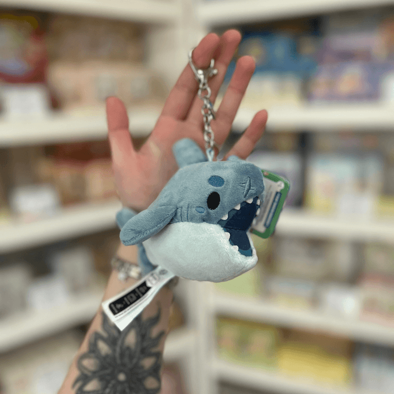 Micro Squishable Megalodon Keychain plush with soft blue body, open mouth, tiny teeth and silver clip