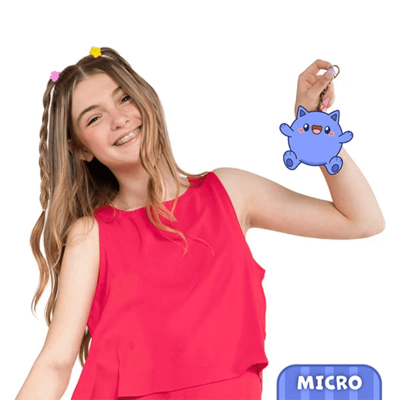 Micro Squishable plush keychain size guide shown with model for scale