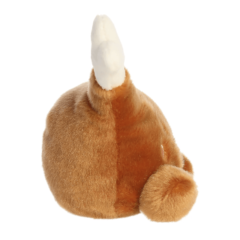 Side view of Palm Pals Mila Drumstick soft toy with white plush bone