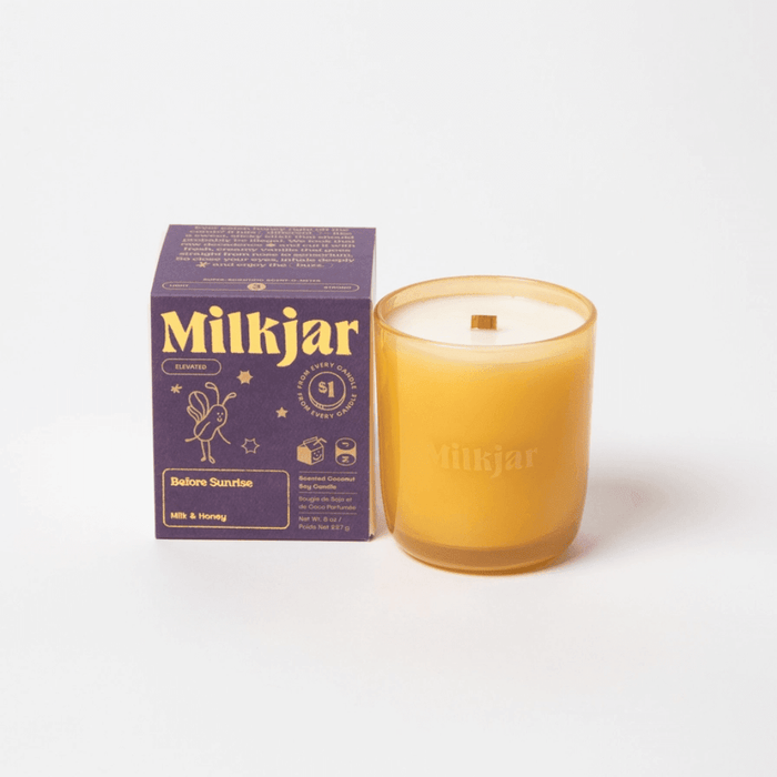 Milkjar Before Sunrise Milk & Honey candle with matching box on a white background