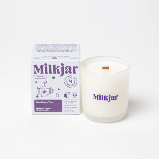 Milkjar Blueberry Tea coconut soy candle 8oz shown with the product box on a clean white background.