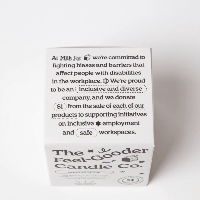 Back of The Feel-Good Candle Co box with inclusive workplace and $1 donation message.