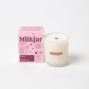 Milkjar Dandy coconut soy candle 8oz shown with the product box on a clean white background.