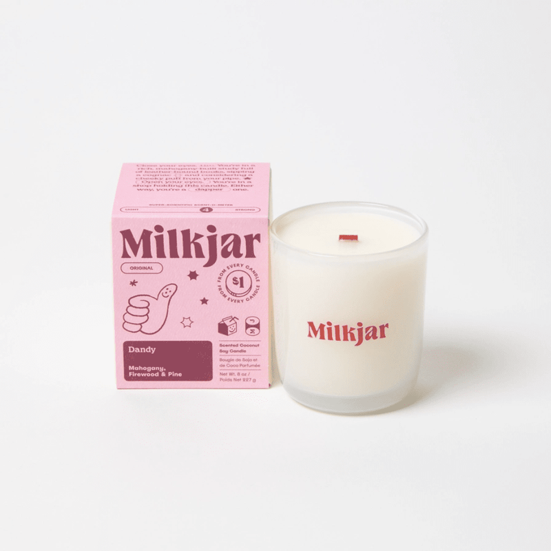 Milkjar Dandy coconut soy candle 8oz shown with the product box on a clean white background.