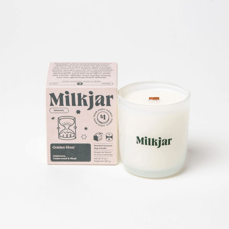 Milkjar Golden Hour candle with matching box on a white background.