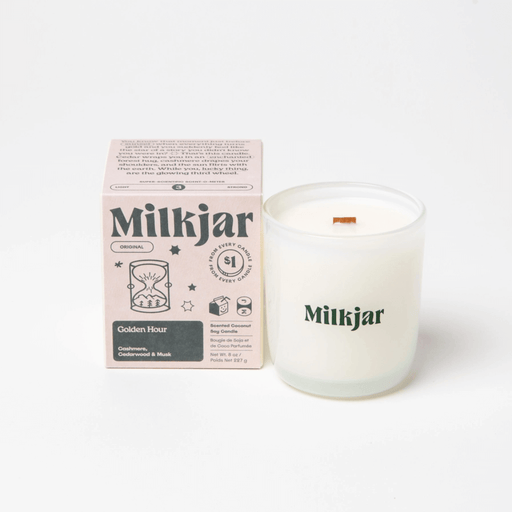 Milkjar Golden Hour candle with matching box on a white background.