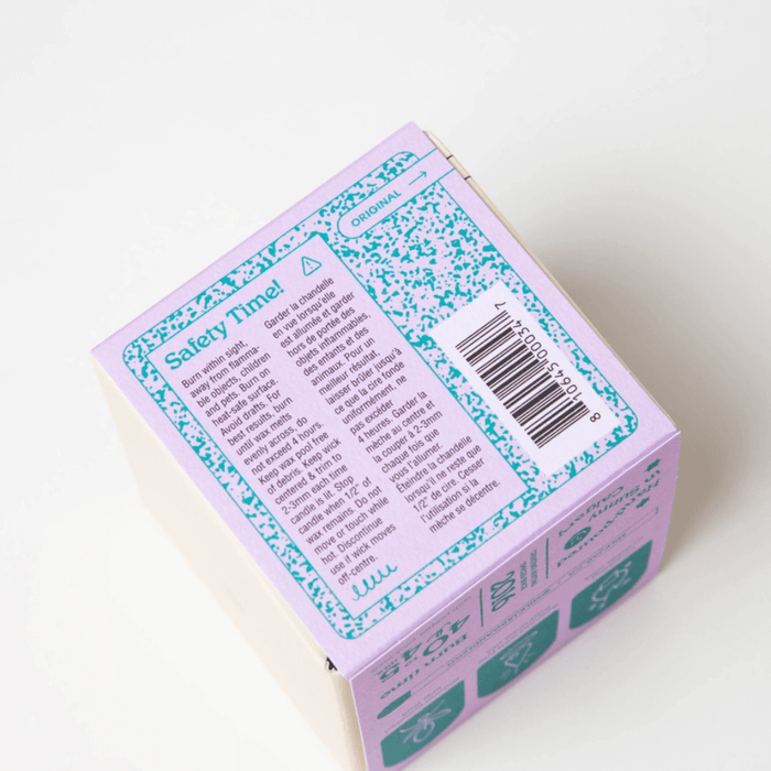 Top of Milkjar Hawaii candle box showing the safety label and barcode.