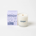 Milkjar Hygge coconut soy candle 8oz shown with the product box on a clean white background.
