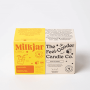 Milkjar Lemonade candle box next to The Feel-Good Candle Co box on a white background.