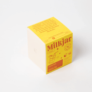 Back of The Feel-Good Candle Co box with inclusive workplace message and $1 donation information.