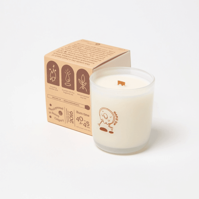 Milkjar Maple Dip candle with box angled behind, showing wooden wick, fragrance oil and coconut soy wax icons.