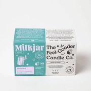 Milkjar Woodland box beside The Feel-Gooder Candle Co. packaging on a white background.