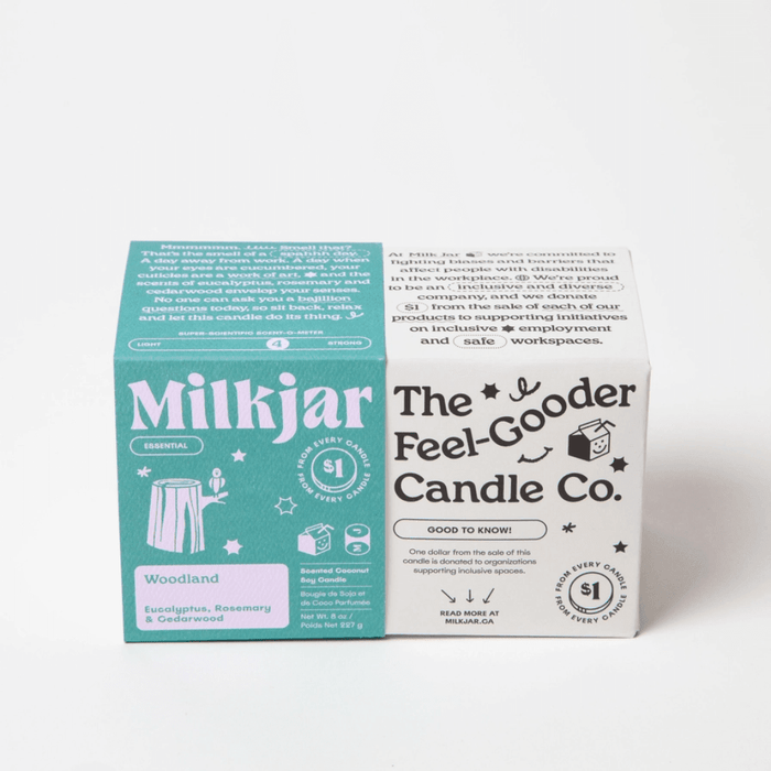 Milkjar Woodland box beside The Feel-Gooder Candle Co. packaging on a white background.