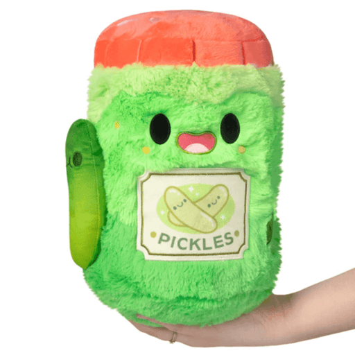 Front view of the Mini Comfort Food Jar of Pickles plush toy with pickles label and smiling face