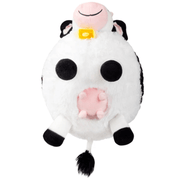 Underside view of Squishable Mini Cow plush toy showing legs and pink udder detail