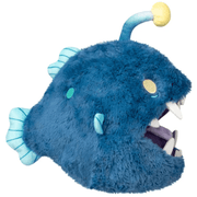 Side view of Squishable Anglerfish plush with its large open mouth, pointed teeth and curved lure