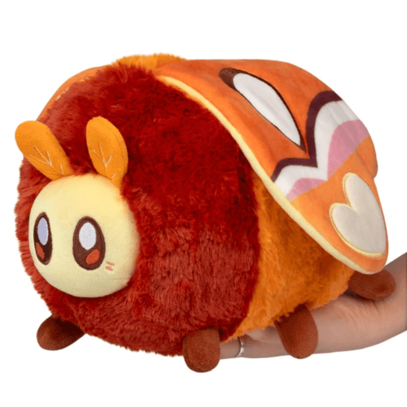 Mini Squishable Atlas Moth plush with a rust-orange body and patterned wings