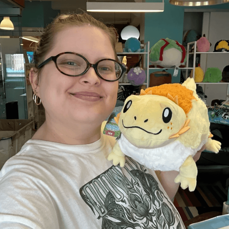 Mini Squishable Bearded Dragon plush being held to show its size