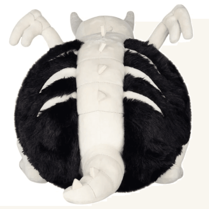 Back view of Mini Squishable Bone Dragon plush showing white spine details and curled tail