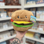 Mini Squishable Comfort Food Cheeseburger plush toy held in hand, front view with smiling face and layered burger details