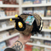 Mini Squishable Death's-head Hawkmoth plush toy held in hand side view