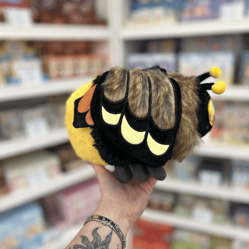 Mini Squishable Death's-head Hawkmoth plush toy held in hand showing wing detail