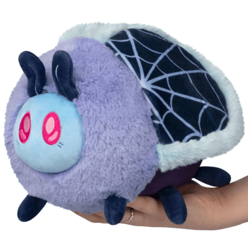 Mini Squishable Haunted Moth plush with lavender fur and web-patterned wings