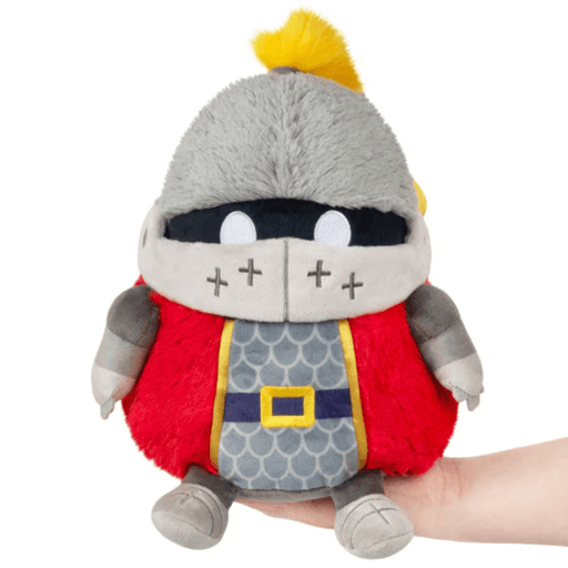 Front view of Mini Squishable Knight plush toy with red cape, grey armour and yellow plume