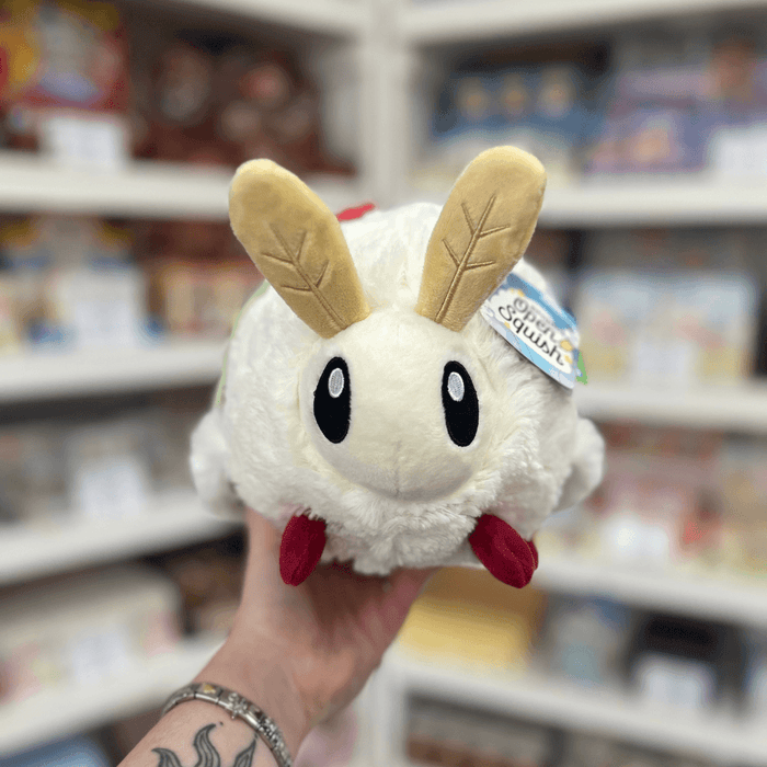 Mini Squishable Luna Moth plush toy held in hand front view