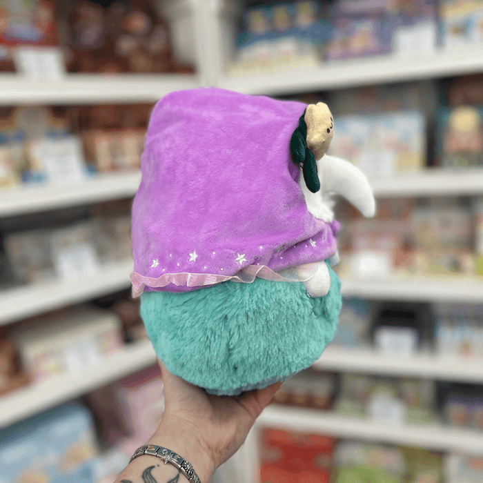 Mini Squishable Mermaid Plague Nurse plush toy held in hand, side view