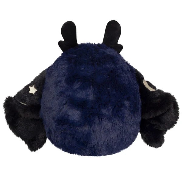 Back view of Mini Squishable Midnight Mothman plush showing deep navy fur and folded wings