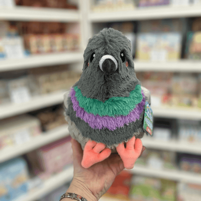 Mini Squishable Pigeon plush toy held in hand, front view