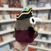 Mini Squishable Pirate Plague Doctor plush toy held in hand, side view