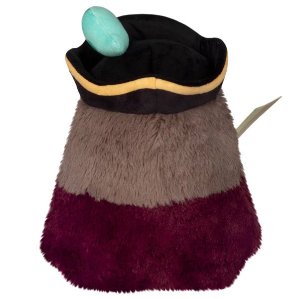 Back of Mini Squishable Pirate Plague Doctor showing fuzzy cape, black hat, and parrot tail.