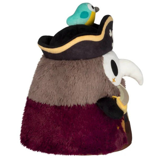 Side view of Pirate Plague Doctor plush with plush sword and green parrot on pirate hat.