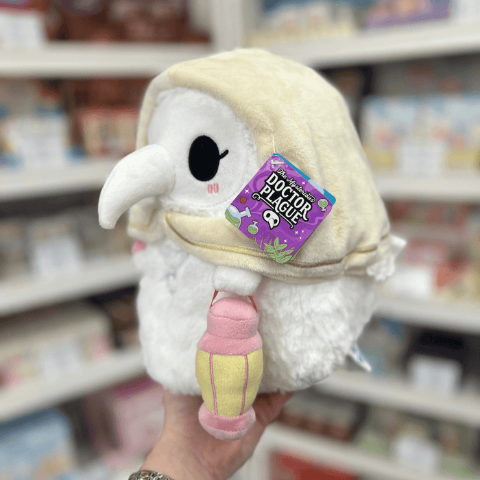 Mini Squishable Plague Nurse plush toy held in hand with tag visible