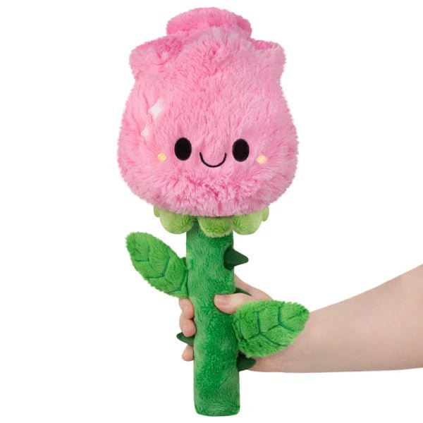 Mini Squishable Rose plush toy with pink fluffy rosebud face and green stem, held in hand