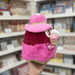 Back view of Mini Squishable Sakura Plague Doctor plushie with bright pink fur, burgundy cloak and soft floral hat