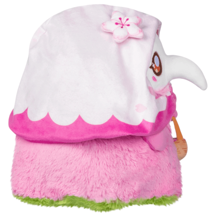 Side view of Mini Squishable Sakura Plague Nurse Plush with blossom hood and basket detail